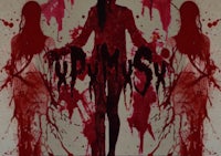 a woman with blood on her face is standing in front of a bloody background